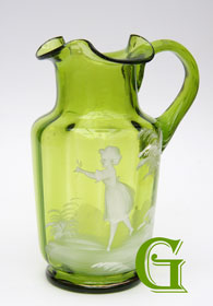 Mary Gregory green glass jug